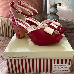 BAIT red pin-up retro style heels with ankle straps.